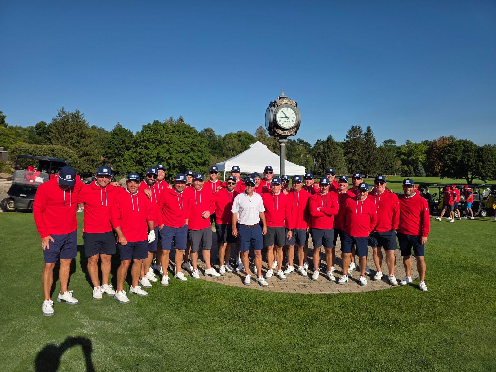 Team Maple Bluff posed at the Nakoma Golf Club clock