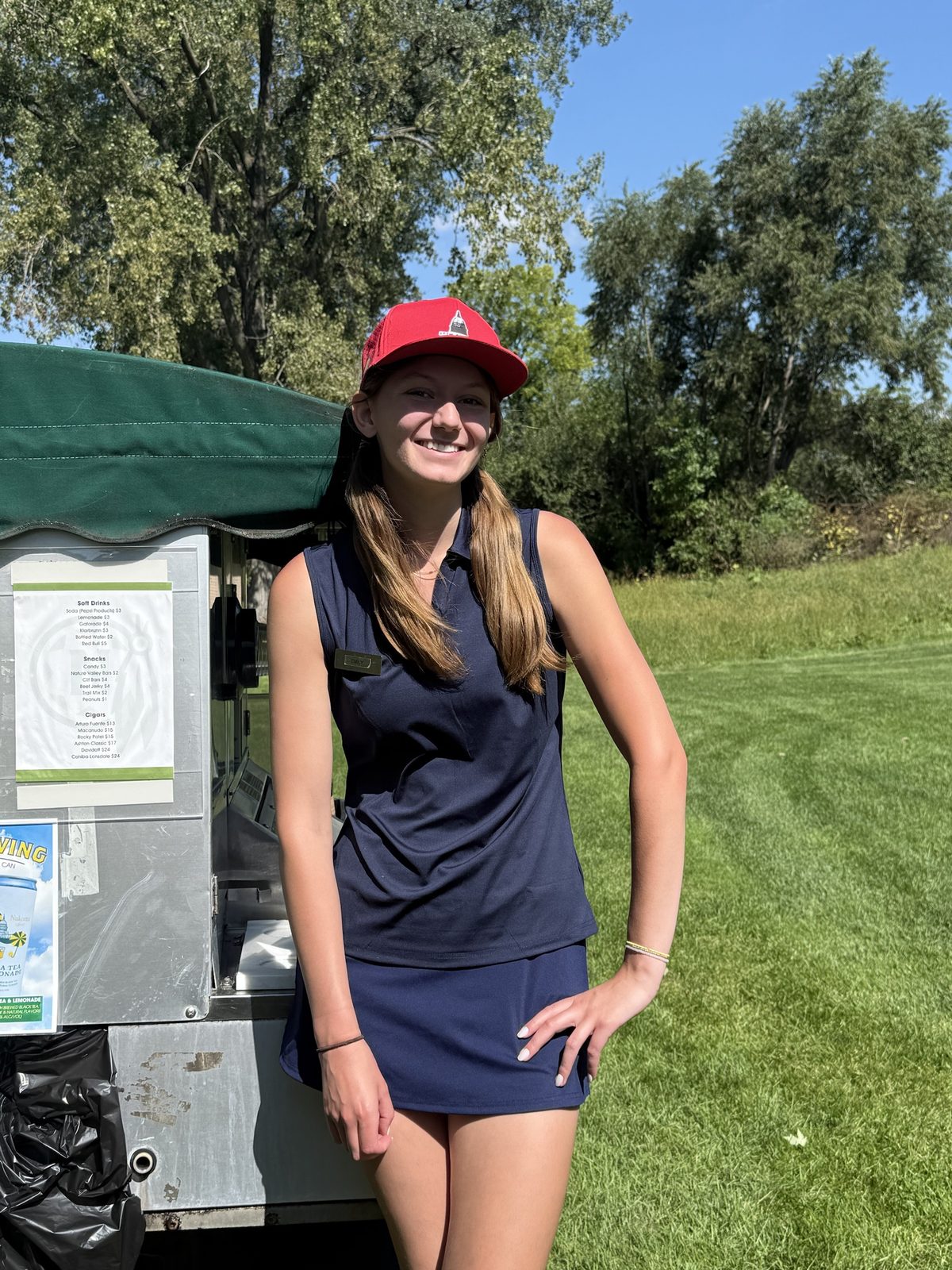 Beverage cart attendant on the course